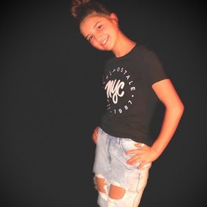 Black T-shirt w/ Purple lettering - never worn